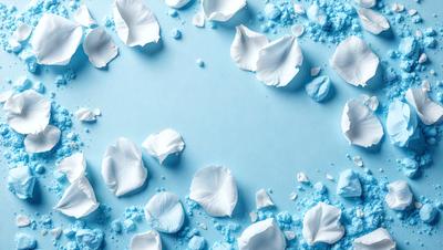 The primary subject of the image is a collection of white flowers, which are scattered across a blue surface. The setting appears to be a studio or a controlled environment, as the flowers are arranged in a visually appealing manner. The visual style of the image is a combination of photo and digital art, creating a unique and artistic representation of the flowers. The dominant colors in the image are white and blue, giving the scene a calm and serene atmosphere.