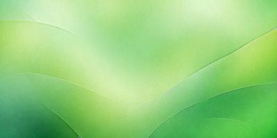 The primary subject of the image is a close-up of a green leaf. The setting is a leafy green background, which adds to the natural and organic feel of the scene. The visual style is a photo, capturing the intricate details of the leaf. The dominant colors are green, which creates a calm and soothing atmosphere.