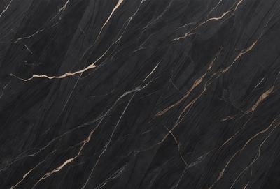 The primary subject of the image is a marble countertop with a black and gold pattern. The setting is a kitchen, and the visual style is a close-up of the marble countertop. The colors and mood of the image are predominantly black and gold, giving it a luxurious and elegant appearance.