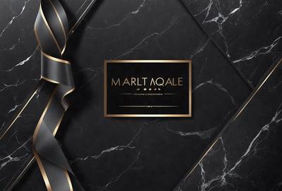 The primary subject of the image is a business card for a company called Marlt Aale. The card is displayed on a black marble surface, which adds a sophisticated and elegant touch to the presentation. The visual style of the image is a combination of photo and digital art, creating a professional and polished appearance. The colors and mood of the image are predominantly black and white, giving it a classic and timeless feel.
