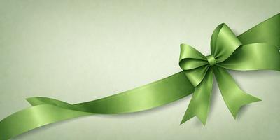The primary subject of the image is a green bow, which is prominently displayed in the foreground. The setting is a green background, which complements the green bow. The visual style is a close-up of the bow, emphasizing its details. The colors and mood of the image are predominantly green, creating a calm and serene atmosphere.
