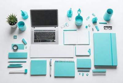 The primary subject of the image is a laptop computer, which is placed on a table. The setting is an office environment, with various office supplies and items surrounding the laptop. The visual style is a combination of digital art and illustration, creating a modern and professional appearance. The colors and mood of the image are predominantly blue, which gives the scene a calm and organized atmosphere.