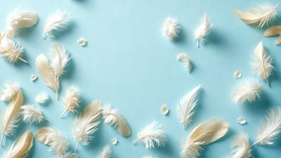 The primary subject of the image is a collection of white feathers scattered across a blue surface. The feathers are of various sizes and are spread out across the background, creating a visually appealing and artistic scene. The visual style of the image is a combination of photo and digital art, as it captures the beauty of the feathers in a realistic yet artistic manner. The colors and mood of the image are predominantly blue and white, giving it a serene and calming atmosphere.