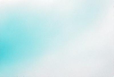 The primary subject of the image is a cloudy blue sky. The setting is a vast, open space with no visible landmarks or objects. The visual style is a natural, outdoor scene. The colors and mood are predominantly blue and serene, creating a peaceful and tranquil atmosphere.