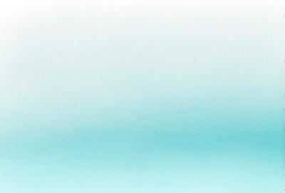 The primary subject of the image is a large body of water, which appears to be a vast ocean. The setting is a clear blue sky, creating a serene and peaceful atmosphere. The visual style of the image is a photo, capturing the beauty of the ocean and the sky. The colors and mood of the image are predominantly blue, which adds to the calming and tranquil ambiance.