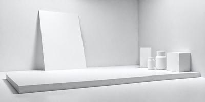 The primary subject of the image is a white wall with a mirror propped up against it. The setting is a room with a white background, and the visual style appears to be a photo. The colors and mood of the image are predominantly white, creating a clean and minimalist atmosphere.