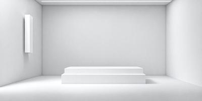 The primary subject of the image is a white box or table, which is the main object in the scene. The setting is a white wall, and the visual style is a photo. The colors and mood of the image are predominantly white, giving it a clean and minimalist appearance.