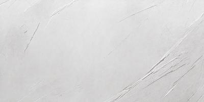 The primary subject of the image is a white wall with a smooth, unblemished surface. The setting is a room with a white background, which creates a clean and minimalist atmosphere. The visual style is a close-up of the wall, showcasing its texture and reflecting light. The colors and mood are predominantly white, giving the image a calm and serene feel.
