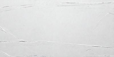 The primary subject of the image is a white wall with a white background. The visual style is a photo, and the colors and mood are predominantly white, giving the scene a clean and minimalist appearance.