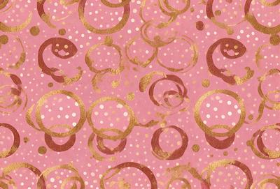 The primary subject of the image is a patterned surface with a pink background. The pattern consists of circles and dots, creating a visually appealing and unique design. The setting appears to be a decorative or artistic environment, possibly for a wallpaper or fabric design. The visual style of the image is a combination of digital art and illustration, as it showcases a creative and intricate pattern. The colors and mood of the image are predominantly pink, which gives it a warm and inviting atmosphere