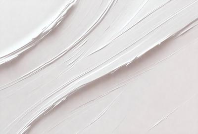 The primary subject of the image is a close-up of a white, textured surface, possibly a wall or a piece of art. The setting appears to be a studio or an artistic environment. The visual style of the image is a combination of photo and digital art, creating a unique and artistic representation of the white surface. The colors and mood of the image are predominantly white, giving it a clean and minimalist appearance.