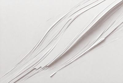 The primary subject of the image is a white cord or string. The setting is a white background, which provides a clean and minimalistic appearance. The visual style is a close-up of the cord, showcasing its texture and details. The colors and mood of the image are predominantly white, giving it a clean and simple appearance.
