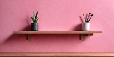 The primary subject of the image is a wooden shelf with two potted plants on it. The plants are placed in a grey pot and a black pot, respectively. The setting is a pink wall, which adds a vibrant and warm atmosphere to the scene. The visual style is a realistic representation of the objects in the image. The colors and mood convey a sense of freshness and natural beauty, with the pink wall providing a contrasting backdrop to the plants.