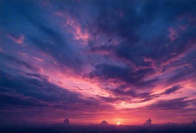 The primary subject of the image is a beautiful sunset, with the sun setting behind a cloudy sky. The setting is a vast, open landscape, possibly a mountain range, with a few clouds scattered throughout the scene. The visual style of the image is a combination of photo and digital art, creating a stunning and vibrant atmosphere. The dominant colors in the image are pink, orange, and purple, which evoke a sense of warmth and tranquility.