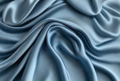 The primary subject of the image is a blue fabric, which appears to be a piece of cloth or a curtain. The setting is a room with a blue background, which adds to the overall atmosphere. The visual style of the image is a close-up of the blue fabric, showcasing its texture and details. The colors and mood of the image are predominantly blue, creating a calm and serene atmosphere.