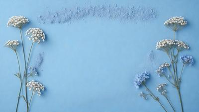 The primary subject of the image is a blue background with white flowers scattered across it. The setting appears to be a studio or a controlled environment, as the flowers are placed in a deliberate manner. The visual style of the image is a combination of photo and digital art, creating a unique and artistic representation of the flowers. The dominant colors in the image are blue and white, giving it a calm and serene atmosphere.