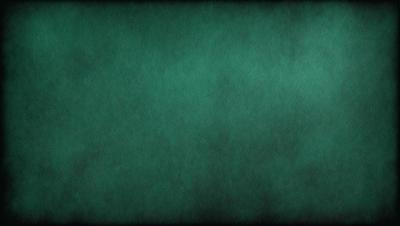 The primary subject of the image is a green background. The setting is a dark green surface, possibly a wall or a piece of fabric. The visual style is a close-up of the green background, which gives the image a moody and dramatic appearance. The colors and mood of the image are predominantly dark and subdued, with the green background being the main focus.