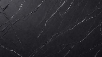 The primary subject of the image is a black marble wall with a pattern of white lines. The setting is a room with a black background, which emphasizes the contrast between the marble wall and the rest of the space. The visual style is a close-up of the marble wall, showcasing its unique texture and pattern. The colors and mood of the image are predominantly black and white, creating a sense of elegance and sophistication.