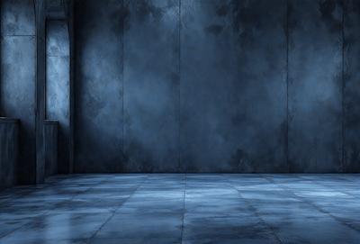 The primary subject of the image is a large, empty room with a blue wall. The setting is a dark room with a blue wall, and the visual style is a photo. The colors and mood of the image are predominantly blue, creating a calm and serene atmosphere.