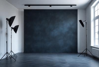 The primary subject of the image is a black and white photo of a room with a black background. The setting is a room with a black background, and the visual style is a black and white photograph. The colors and mood of the image are predominantly black and white, creating a classic and timeless atmosphere.