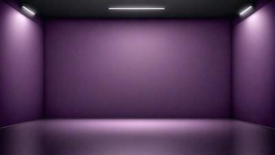Purple wall with a light shining on it.