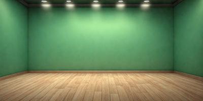 The primary subject of the image is a green wall with a wooden floor. The setting is a room with a green wall, and the visual style is a photo. The dominant colors are green and brown, creating a calm and natural atmosphere.