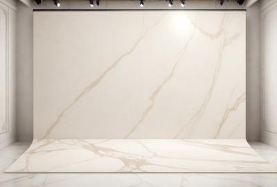 The primary subject of the image is a large, white marble wall. The setting is a room with a white background, and the visual style appears to be a photo. The colors and mood of the image are predominantly white, giving it a clean and minimalist appearance.
