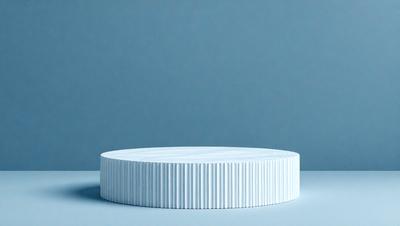 The primary subject of the image is a white, circular object, possibly a plate or a bowl, placed on a blue surface. The setting appears to be a room with a blue wall, and the visual style is a close-up of the white object on the blue background. The colors and mood of the image are predominantly blue and white, creating a calm and serene atmosphere.