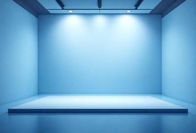 The primary subject of the image is a large, empty room with a blue wall. The setting is a white room with a blue wall, and the visual style is a photo. The room appears to be a large, empty space with a blue wall, and the colors and mood are predominantly blue, creating a calm and serene atmosphere.