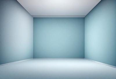 The primary subject of the image is a large, empty room with a blue wall. The setting is a white room with a blue wall, and the visual style is a photo. The colors and mood of the image are predominantly blue, creating a calm and serene atmosphere.
