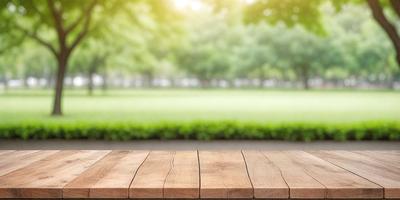 The primary subject of the image is a wooden bench situated in a park. The bench is placed on a grassy field, surrounded by trees and a lush green landscape. The setting appears to be a serene and peaceful environment, perfect for relaxation and enjoying nature. The visual style of the image is a photo, capturing the natural beauty of the park and the wooden bench. The colors and mood of the image are predominantly green, with the grass, trees, and wooden bench all contributing
