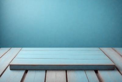 The primary subject of the image is a wooden plank or board, which is blue in color. The setting is a blue wall, and the visual style appears to be a photo. The dominant colors in the image are blue and white, creating a calm and serene atmosphere.