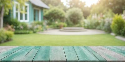 The primary subject of the image is a wooden deck with a green surface. The deck is situated in a backyard with a garden setting, featuring a variety of plants and flowers. The visual style of the image is a photo, capturing the natural beauty of the garden and the wooden deck. The colors and mood of the image are predominantly green, reflecting the lush garden and the serene atmosphere of the backyard.