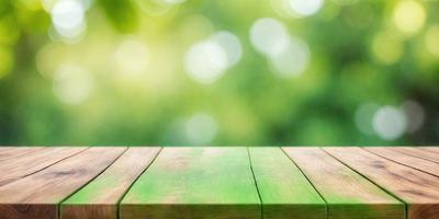 The primary subject of the image is a wooden bench with a green surface. The setting is a lush green forest, with trees and leaves visible in the background. The visual style is a photo, capturing the natural beauty of the forest. The colors and mood of the image are predominantly green, creating a serene and peaceful atmosphere.