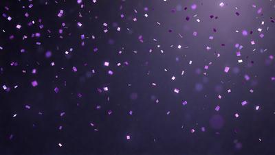 Purple confetti is falling in the air, creating a purple and white color scheme. The confetti is scattered throughout the scene, with some pieces falling closer to the foreground and others further in the background. The overall atmosphere is festive and celebratory.