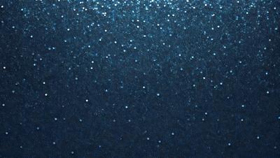 The primary subject of the image is a blue background with a pattern of glittering stars. The setting is a dark, starry night, and the visual style is a combination of a photo and digital art. The colors and mood of the image are predominantly dark and mysterious, with the blue background and glittering stars creating a sense of depth and intrigue.