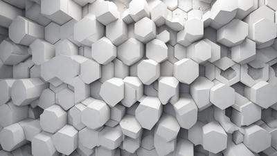 The primary subject of the image is a large wall made of white hexagonal shapes. The setting is a white wall, and the visual style is a photo. The dominant colors are white, and the overall atmosphere is clean and minimalistic.