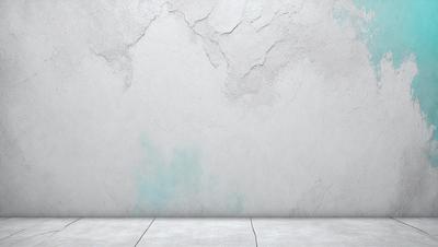 The primary subject of the image is a large, white, textured wall. The setting is a room with a concrete floor. The visual style is a photo, and the colors and mood are predominantly white and neutral.