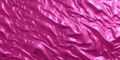 The primary subject of the image is a close-up of a pink, textured surface. The setting appears to be a room with a pink wall, and the visual style is a photo. The dominant colors in the image are pink, and the overall atmosphere is smooth and visually appealing.