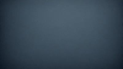 The primary subject of the image is a blue sky. The setting is a cloudy day, with the sky being the main focus of the image. The visual style is a natural, outdoor scene. The colors and mood of the image are predominantly blue, creating a calm and serene atmosphere.