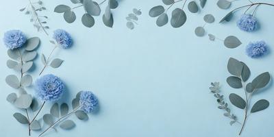 The primary subject of the image is a blue flower, which is the main focus of the scene. The setting is a blue wall, providing a contrasting background to the flower. The visual style of the image is a photo, capturing the beauty of the blue flower in its natural environment. The dominant colors in the image are blue and white, creating a calm and serene atmosphere.