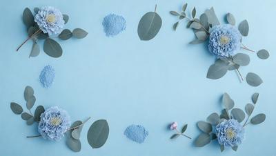 The primary subject of the image is a blue background with a leafy plant and a blue flower. The setting is a blue table, and the visual style is a photo. The dominant colors are blue and green, creating a calm and serene atmosphere.