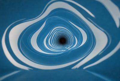 The primary subject of the image is a spiral-shaped tunnel or a hole in the center of a blue surface. The setting is a blue background, and the visual style appears to be a digital art or illustration. The colors and mood of the image are predominantly blue, creating a calm and serene atmosphere.