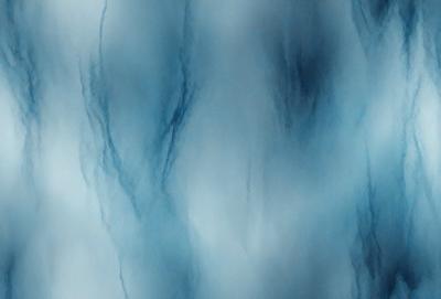 The primary subject of the image is a blue and white marbled wall. The setting is a room with a blue and white marbled wall, which serves as the background. The visual style is a photo, capturing the intricate patterns and colors of the marbled wall. The dominant colors are blue and white, creating a calm and serene atmosphere.