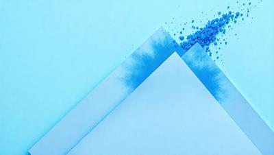 The primary subject of the image is a blue mountain, which is the main focus of the scene. The mountain is set against a white background, creating a striking contrast. The visual style of the image is a combination of photo and digital art, giving it a unique and artistic appearance. The dominant colors in the image are blue and white, creating a sense of depth and tranquility.