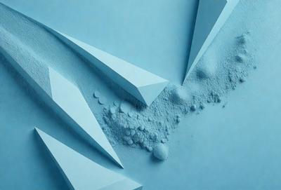 The primary subject of the image is a blue surface with white powder or snow on it. The setting appears to be a blue background, and the visual style is a combination of photo and digital art. The colors are predominantly blue and white, creating a calm and serene atmosphere.