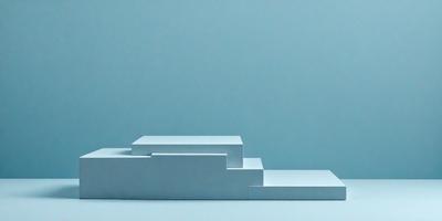 The primary subject of the image is a white box with a blue background. The box is placed on a blue surface, which creates a contrast between the white and blue colors. The visual style of the image is a photo, capturing the details of the white box and the blue background. The colors and mood of the image are predominantly blue and white, giving it a clean and minimalist appearance.