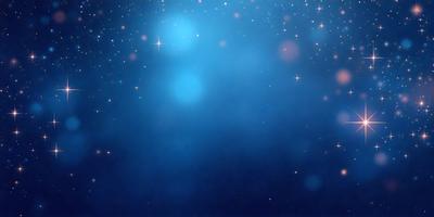 The primary subject of the image is a blue sky filled with stars. The setting is a night sky, and the visual style is a photo. The dominant colors are blue and white, creating a serene and peaceful atmosphere.
