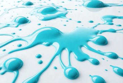 The primary subject of the image is a blue liquid, possibly water or paint, that is dripping or splashing onto a white surface. The setting appears to be a white table or a white background, which contrasts with the blue liquid. The visual style of the image is a close-up of the dripping blue liquid, showcasing its vibrant color and the droplets it forms. The overall atmosphere of the image is dynamic and visually engaging, with the blue liquid creating a striking contrast against the white surface
