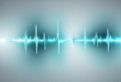 The primary subject of the image is a blue waveform, which is a visual representation of sound. The waveform is displayed on a gray background, giving it a modern and minimalist appearance. The visual style of the image is digital art, as it is a computer-generated representation of sound. The dominant colors in the image are blue and gray, creating a calm and soothing atmosphere.